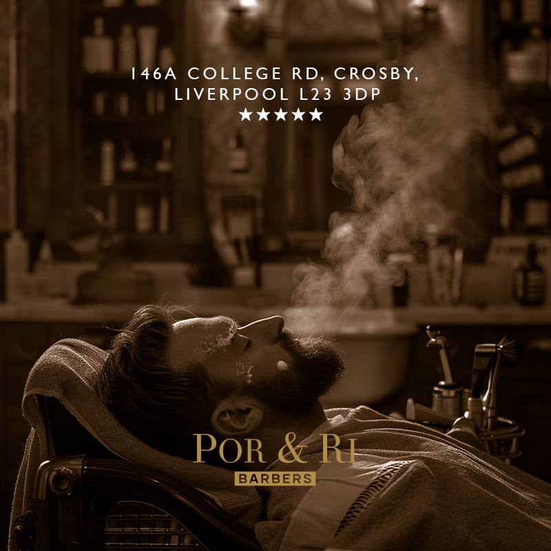 Interior of Por & Ri Barbers showing a modern barber chair, wash basin, and illuminated mirrors in a stylish grooming space.